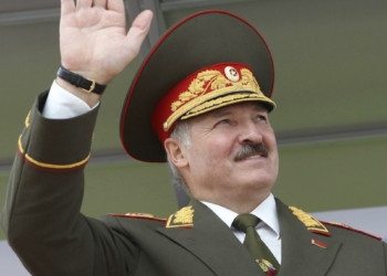 Belarussian President Alexander Lukashenko watches celebrations marking Independence Day in Minsk July 3, 2011. Belarus police clamped down swiftly on planned public protests against Lukashenko on Sunday as he told an open-air rally that a plot was afoot to overthrown his long rule.
 REUTERS/BelTA/Nikolai Petrov/Handout (BELARUS - Tags: POLITICS ANNIVERSARY) FOR EDITORIAL USE ONLY. NOT FOR SALE FOR MARKETING OR ADVERTISING CAMPAIGNS. THIS IMAGE HAS BEEN SUPPLIED BY A THIRD PARTY. IT IS DISTRIBUTED, EXACTLY AS RECEIVED BY REUTERS, AS A SERVICE TO CLIENTS